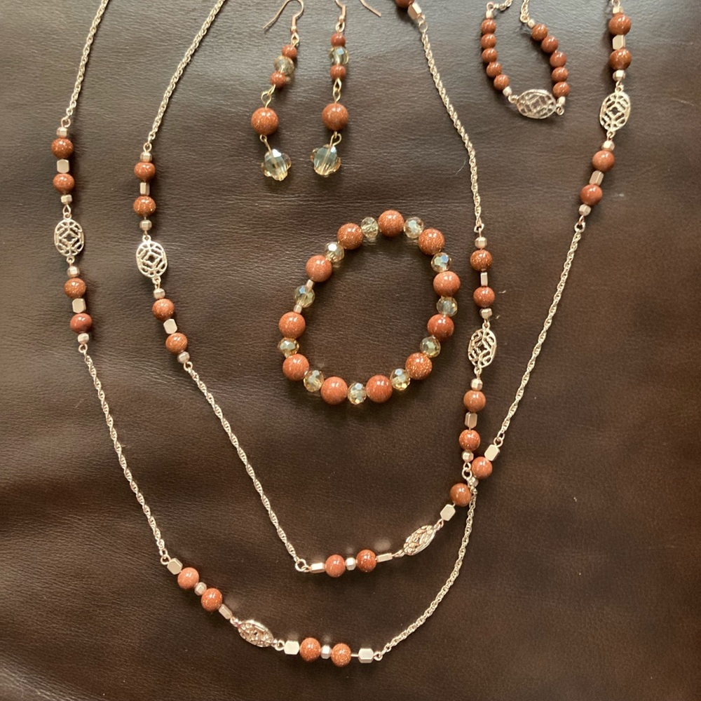 Flecked goldstone and rose gold hematite and Czech glass beads rose gold setting